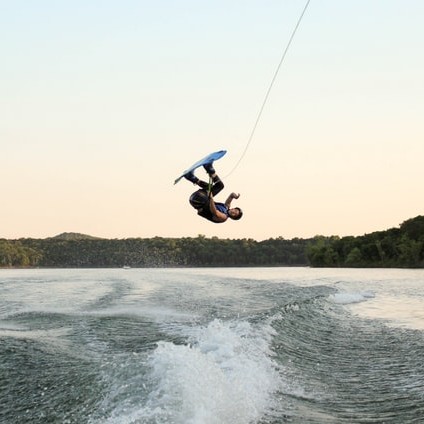 Guy wake-boarding upside down