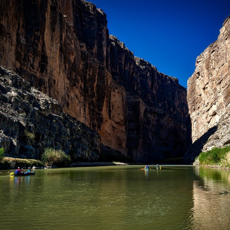 River surrounding by a big Rock